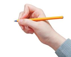 la mano escribe con un bolígrafo aislado en blanco foto
