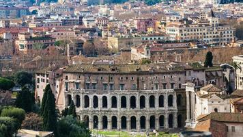 Rome city with ancient Theatre of Marcellus photo