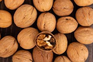 IRipe walnuts in the shell, the theme of healthy eating, vegetarianism, raw food diet. photo