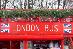 Moscow, Russia - February 15, 2021. Text, London Bus, Cafe. photo