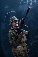 soldier firing into the air in front of black chalkboard photo