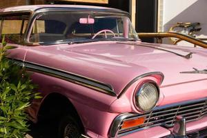 Sharm El Sheikh, Egypt - January 21, 2021 - Pink Limousine, Cadillacc pinck, near Hard Rock Cafe in Naama Bay photo