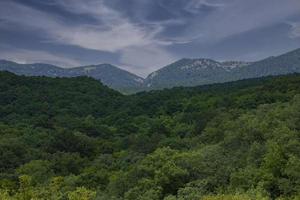 Landscape, mountain valley against the blue sky in the early morning. photo