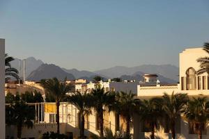 Egypt, Sharm El Sheikh - January 15, 2021 - View of the mountains of the Sinai Peninsula and hotels in the morning. photo