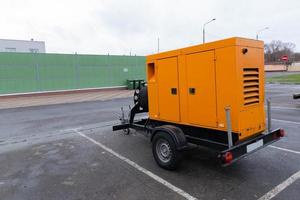 Mobile Diesel generator on a transport trailer powered by diesel fuel, diesel power plants for generating electricity in extreme situations. photo