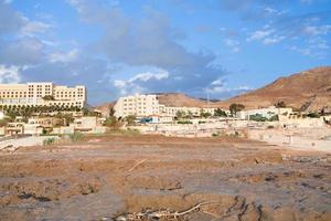 mud beach of Dead sea in Jordan photo