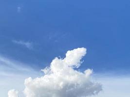 Blue sky and white cloudscape background photo