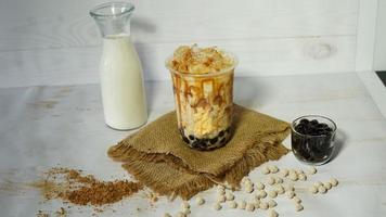 Boba drink with a mixture of milk and palm sugar photo