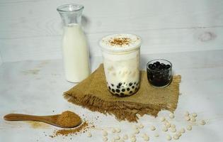 Boba drink with a mixture of milk and palm sugar photo