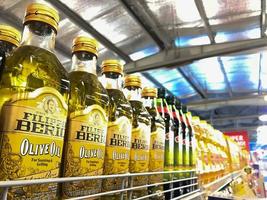 Surakarta, Indonesia - 2022. Display of cooking oil in supermarkets photo