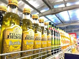 Surakarta, Indonesia - 2022. Display of cooking oil in supermarkets photo