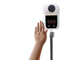 Asian boy's hand measuring body temperature with thermometer prevent covid 19 germs on white photo