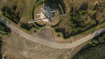 Aerial view of windmills in open field video