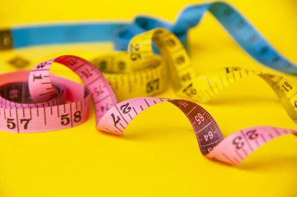 Premium Photo  Yellow tape measure to measure small spaces