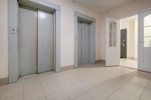 staircase hall in an apartment building  at the entrance to the elevator photo