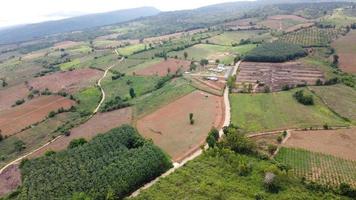 Beautiful aerial view to road with moutains and forest captured from above, photo