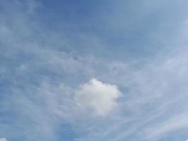 Blue sky and white clouds background on daytime photo