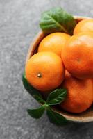 cítricos frescos mandarinas, naranjas foto