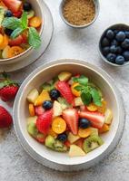 Healthy fresh fruit salad in a bowl photo