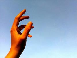 It was a beautiful hand image in the sky. photo