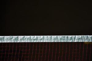 Badminton net in indoor badminton court, Soft and selective focus on net. photo