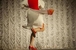 Girl dancing. Folk dance on stage. Dance lesson. photo