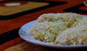 Chicken coated with breadcrumbs is ready to be fried,. photo