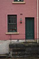 Pinky cherry colour brick townhouse in London photo