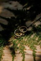 Wedding ring among dry leaves. photo