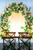 Wedding decorations. Wedding backdrop with flowers and Indonesian wedding decorations. photo