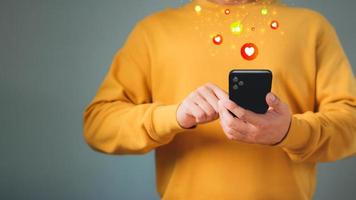 Man hand using smartphone typing live chat chatting on application communication digital web and social network concept. Social media application chat box. photo