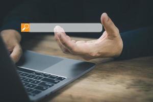 The concept of using technology to search for information, a man's hand is using a smartphone to search for information on social media via the Internet online. photo