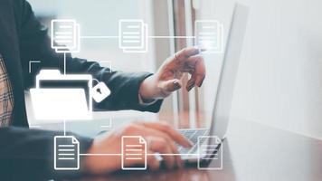 Document Management Systemdms concept. Male hands operating a computer. to manage online that is easy, convenient, fast and enhances the efficiency of digital transformation for the organization photo