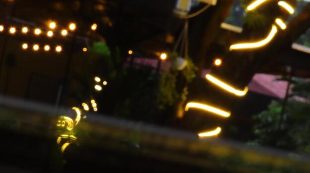 Image of blur street bokeh with colorful lights in night time for background usage photo