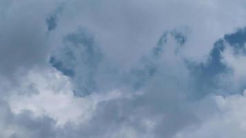 Frame of white clouds over beautiful blue sky photo