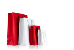Various sizes of holiday shopping gift bags on isolated background PNG. Red and white color png
