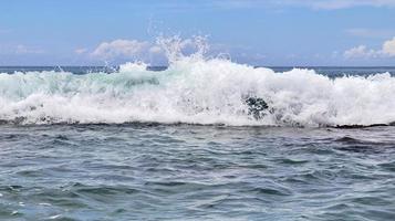 Stunning indian ocean waves at the beaches on the paradise island seychelles photo