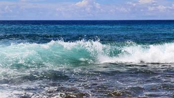 Stunning indian ocean waves at the beaches on the paradise island seychelles photo