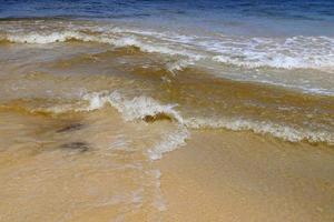 Stunning indian ocean waves at the beaches on the paradise island seychelles photo