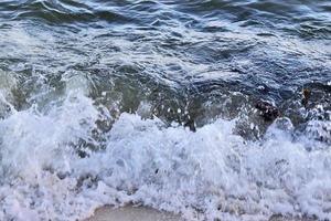 Stunning indian ocean waves at the beaches on the paradise island seychelles photo