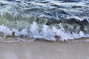 Stunning indian ocean waves at the beaches on the paradise island seychelles photo