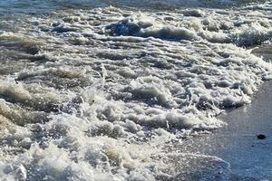 Stunning indian ocean waves at the beaches on the paradise island seychelles photo