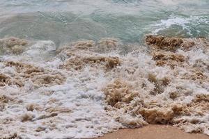 Stunning indian ocean waves at the beaches on the paradise island seychelles photo