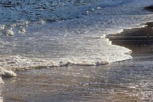 Stunning indian ocean waves at the beaches on the paradise island seychelles photo