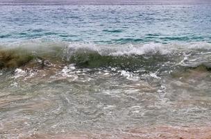 Stunning indian ocean waves at the beaches on the paradise island seychelles photo