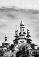 Christian church cross in high steeple tower for prayer photo