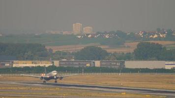 Widebody airplane landing at runway 07L. Frankfurt Airport, Germany video