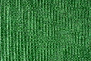 Close up texture of green coarse weave upholstery fabric. Decorative textile background photo