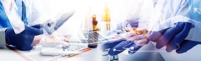 Medicine doctor hand working on a patients x-ray scans digital healthcare and connection with modern virtual screen interface icons, Medical technology and network concept. photo