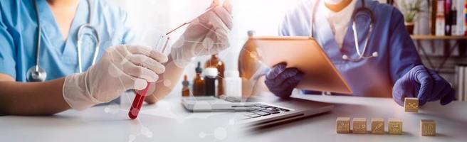 Medicine doctor hand working on a patients x-ray scans digital healthcare and connection with modern virtual screen interface icons, Medical technology and network concept. photo